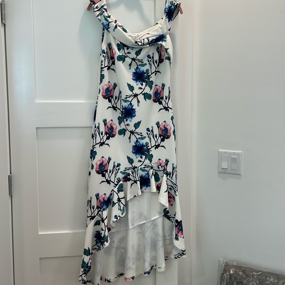 Venus, garden party dress. Nice substance to the material. Not see thru.
